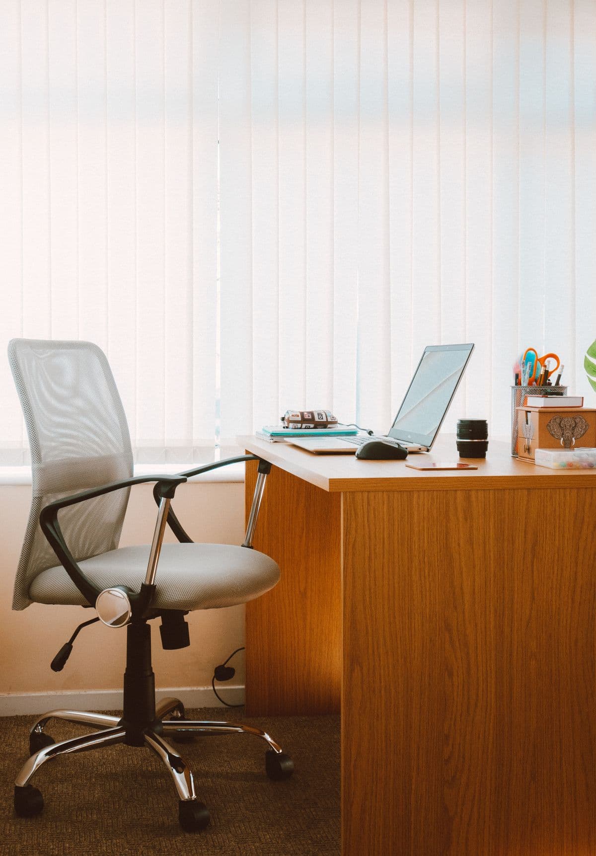 A wooden desk in a home office